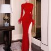 Đầm tay dài đính hoa eo đỏ